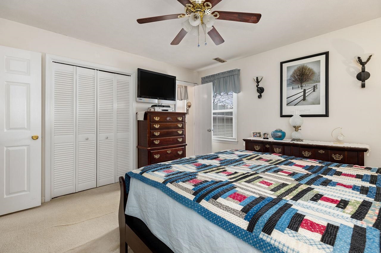 58 Rolla Mill Road Verona, VA 24482 - Photo 36 of 46 a bedroom with a bed and a flat screen tv