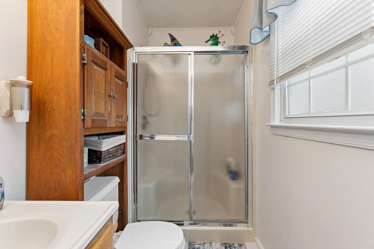58 Rolla Mill Road Verona, VA 24482 - Photo 37 of 46 a bathroom with a shower a toilet and a sink