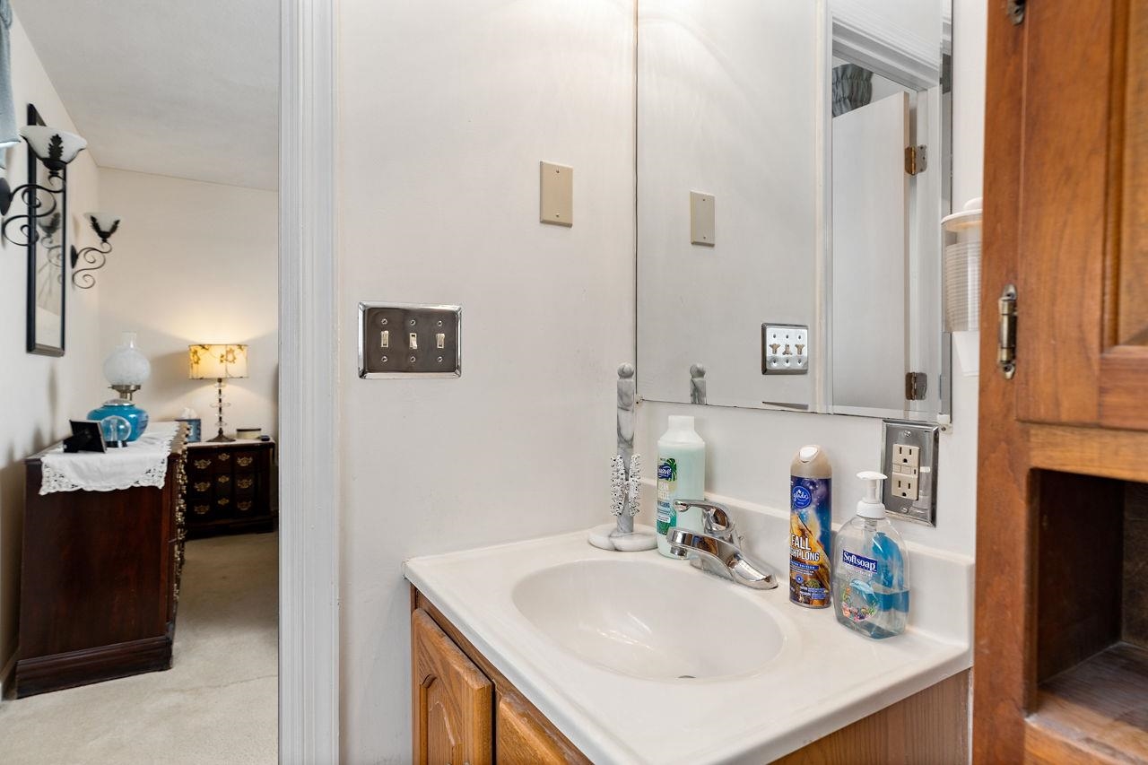 58 Rolla Mill Road Verona, VA 24482 - Photo 38 of 46 a bathroom with a sink double vanity and a mirror