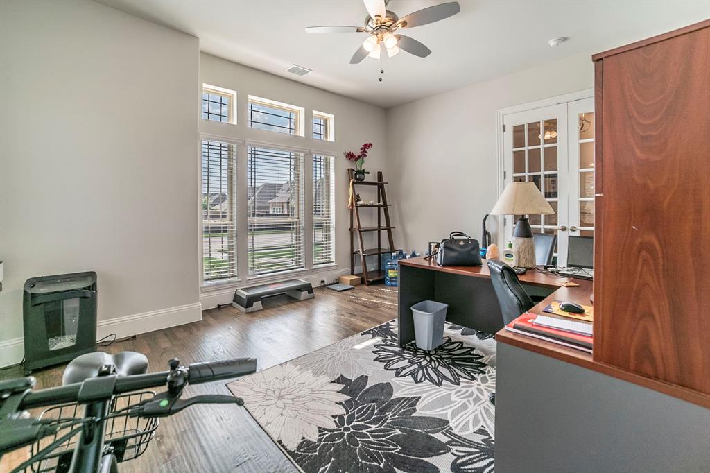 1420 Ashton Ridge Drive Prosper, TX 75078 - Photo 32 of 39 a living room with furniture and wooden floor