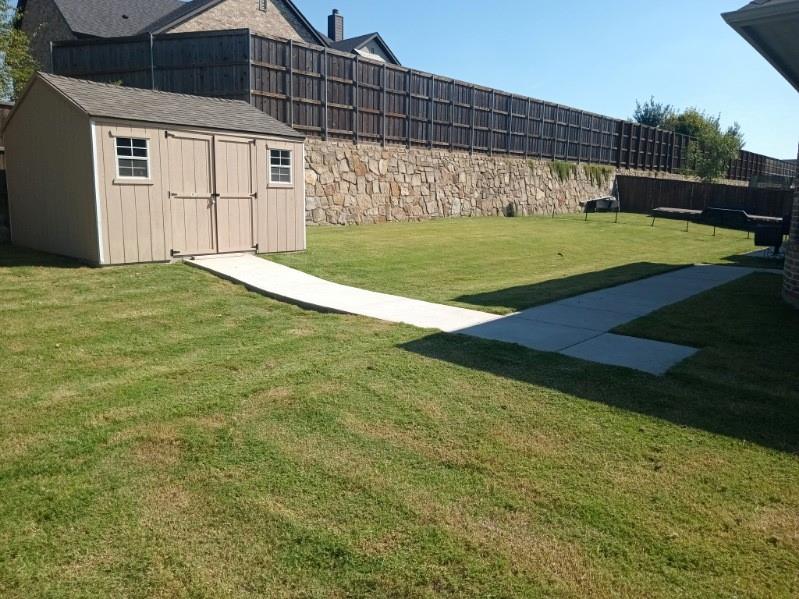1420 Ashton Ridge Drive Prosper, TX 75078 - Photo 34 of 39 a view of a backyard