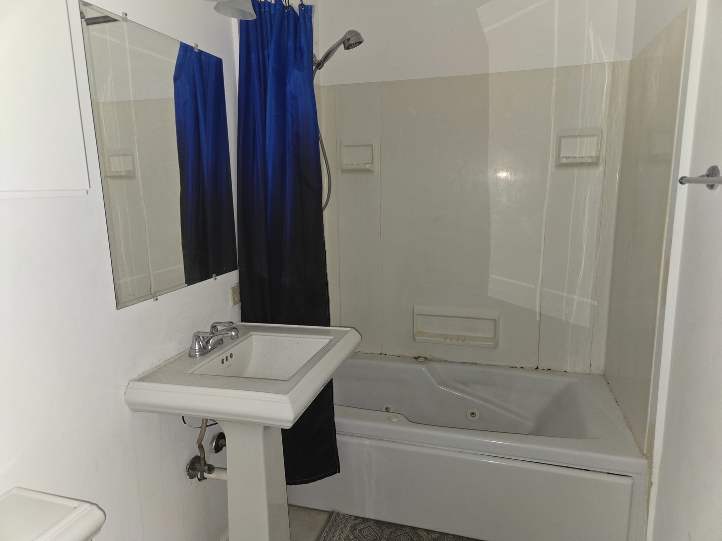 6108 Birmingham Street Chicago Ridge, IL 60415 - Photo 16 of 19 a bathroom with a sink and a mirror