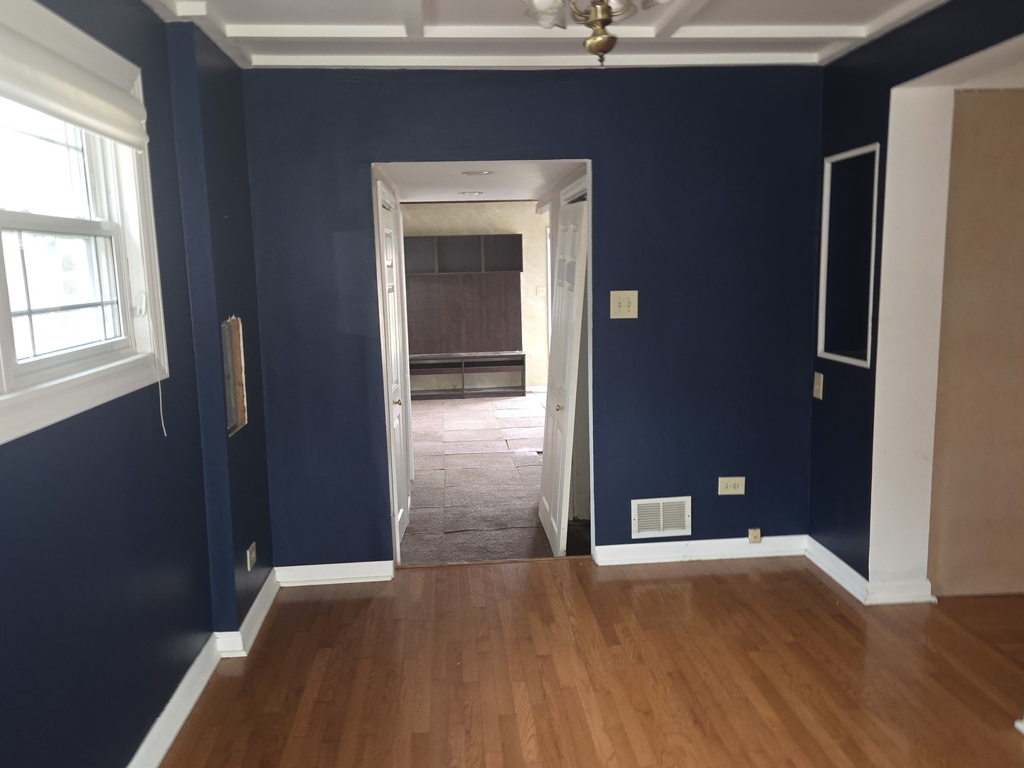 6108 Birmingham Street Chicago Ridge, IL 60415 - Photo 8 of 19 an empty room with wooden floor and windows