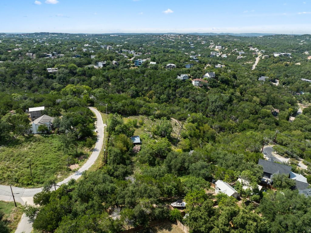 2322 Little Beaver Trail Austin, TX 78734 - Photo 38 of 39 an aerial view of residential houses with outdoor space and trees