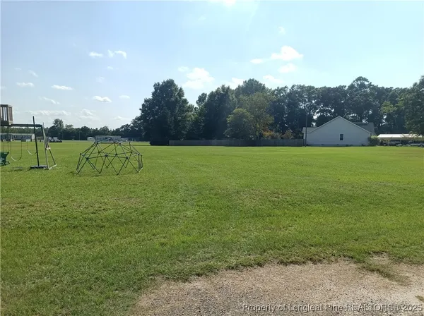 a view of an outdoor space and a yard