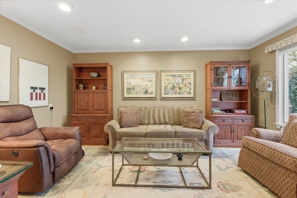 401 Dedham Street, Unit B Newton, MA 02459 - Photo 11 of 33 a living room with furniture and a couch