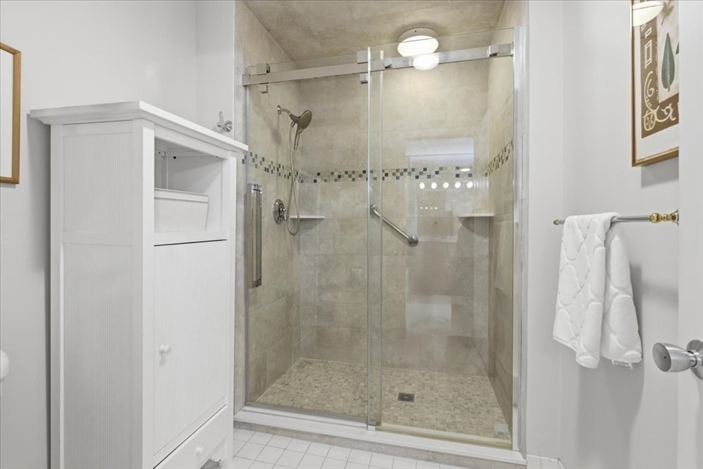 401 Dedham Street, Unit B Newton, MA 02459 - Photo 15 of 33 a bathroom with a shower