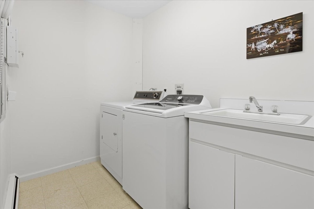 401 Dedham Street, Unit B Newton, MA 02459 - Photo 20 of 33 a utility room with sink dryer and washer