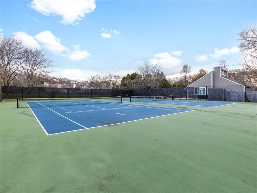 401 Dedham Street, Unit B Newton, MA 02459 - Photo 27 of 33 a view of an outdoor space and tennis court