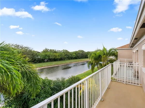 a view of a lake from a balcony
