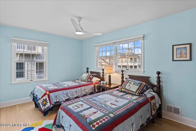 a bedroom with a bed and dresser