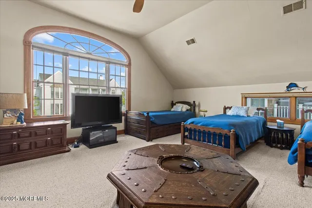 a bathroom with a sink double vanity and a mirror