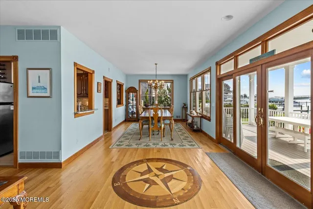 a living room with furniture a fireplace and a window