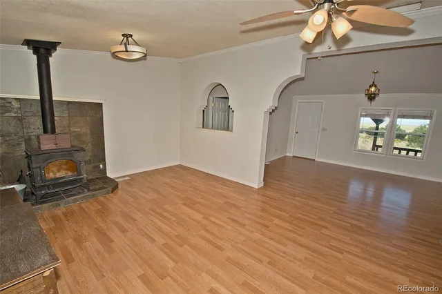 a view of a livingroom with wooden floor
