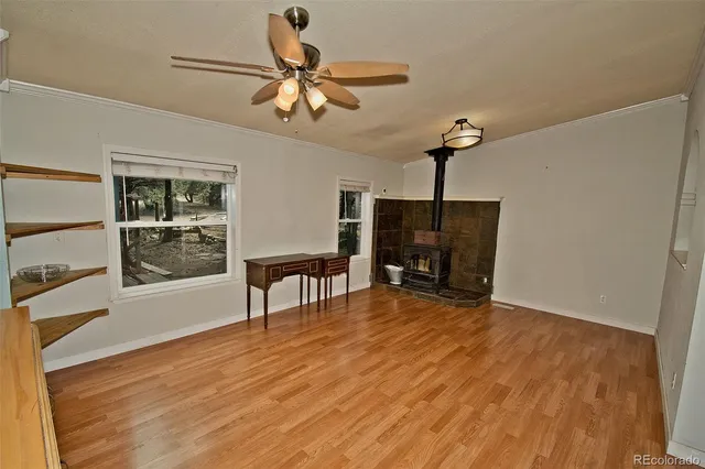 a view of livingroom with furniture wooden floor and window