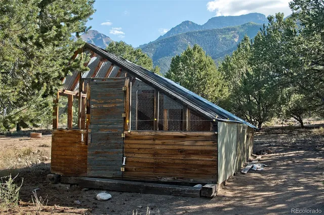 a view of a house with a tree