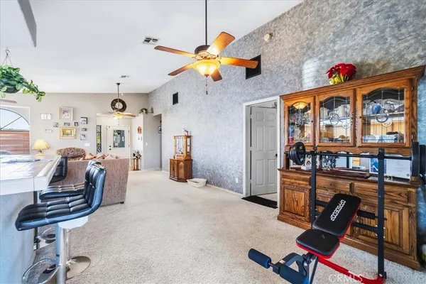 a dining table chair next to a yard