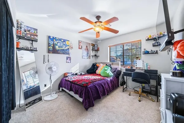 a view of a swimming pool with a lounge chairs