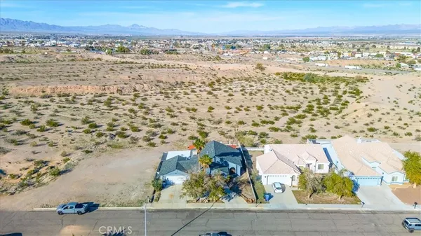 a front view of a house with swimming pool