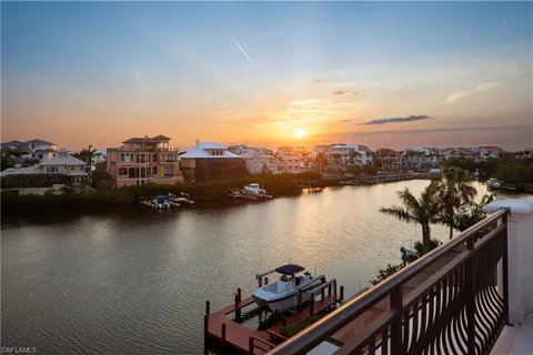 a view of a lake from a balcony