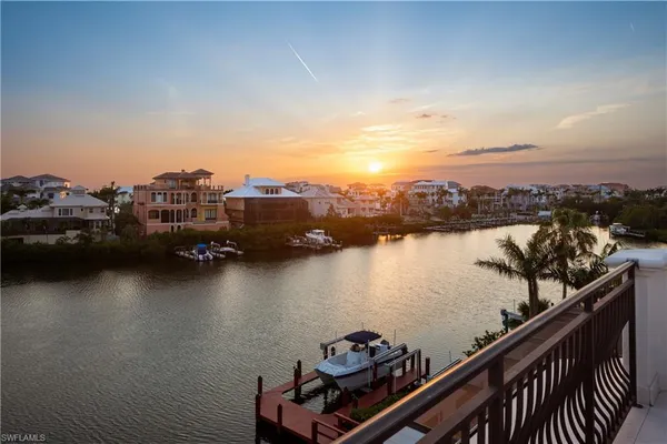 a view of a lake from a balcony