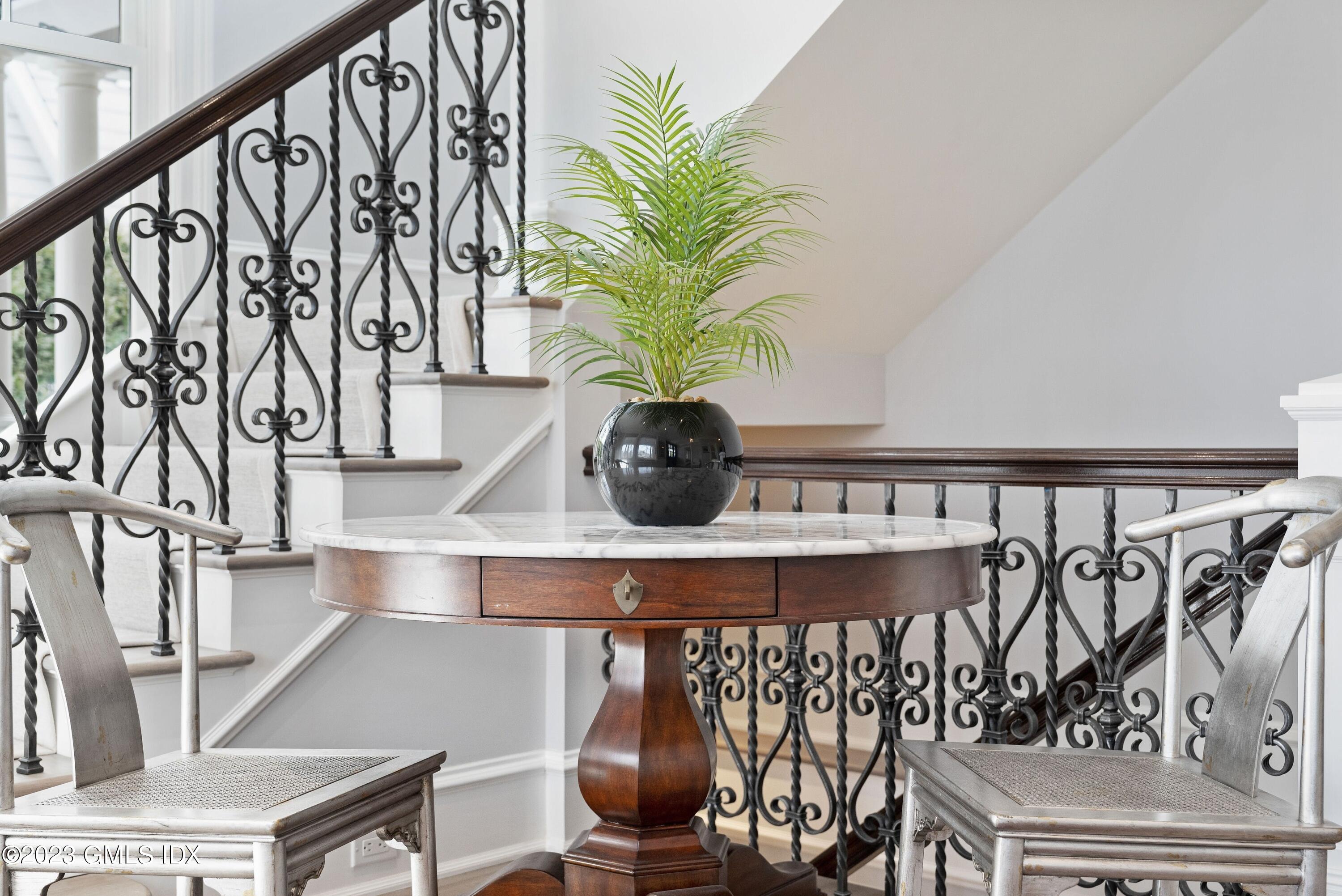 6 Cherry Lane Old Greenwich, CT 06870 - Photo 14 of 31 a vase of flowers sitting on a table