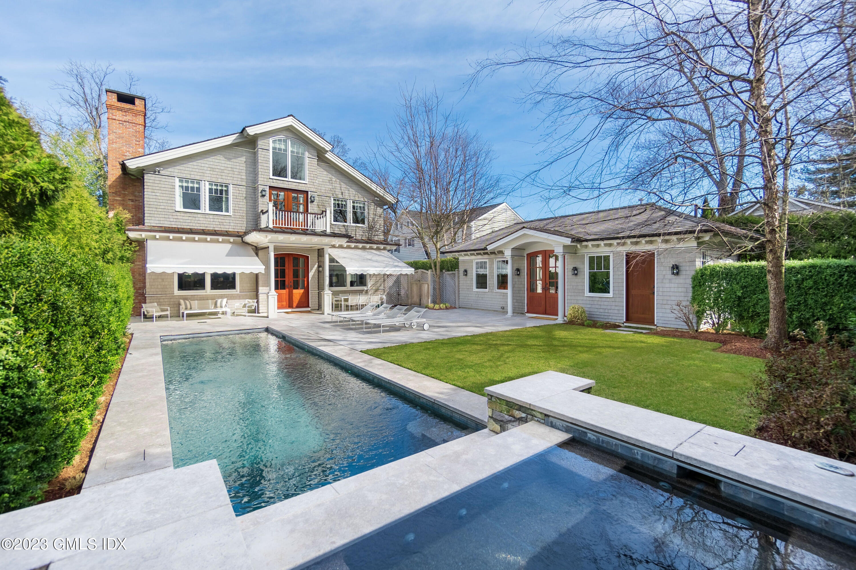 6 Cherry Lane Old Greenwich, CT 06870 - Photo 3 of 31 a view of a house with pool and chairs