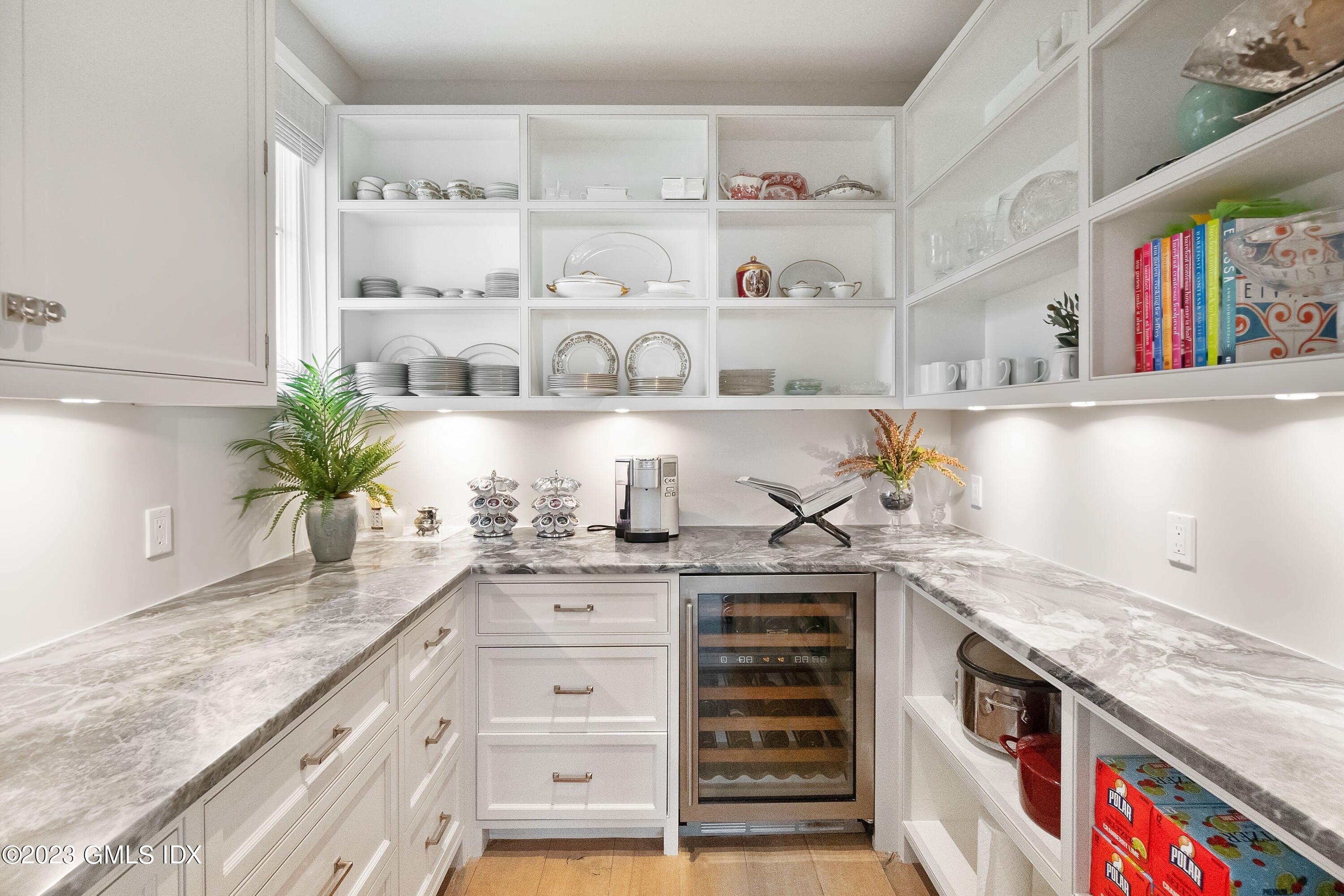 6 Cherry Lane Old Greenwich, CT 06870 - Photo 7 of 31 a kitchen with stainless steel appliances granite countertop a sink and cabinets