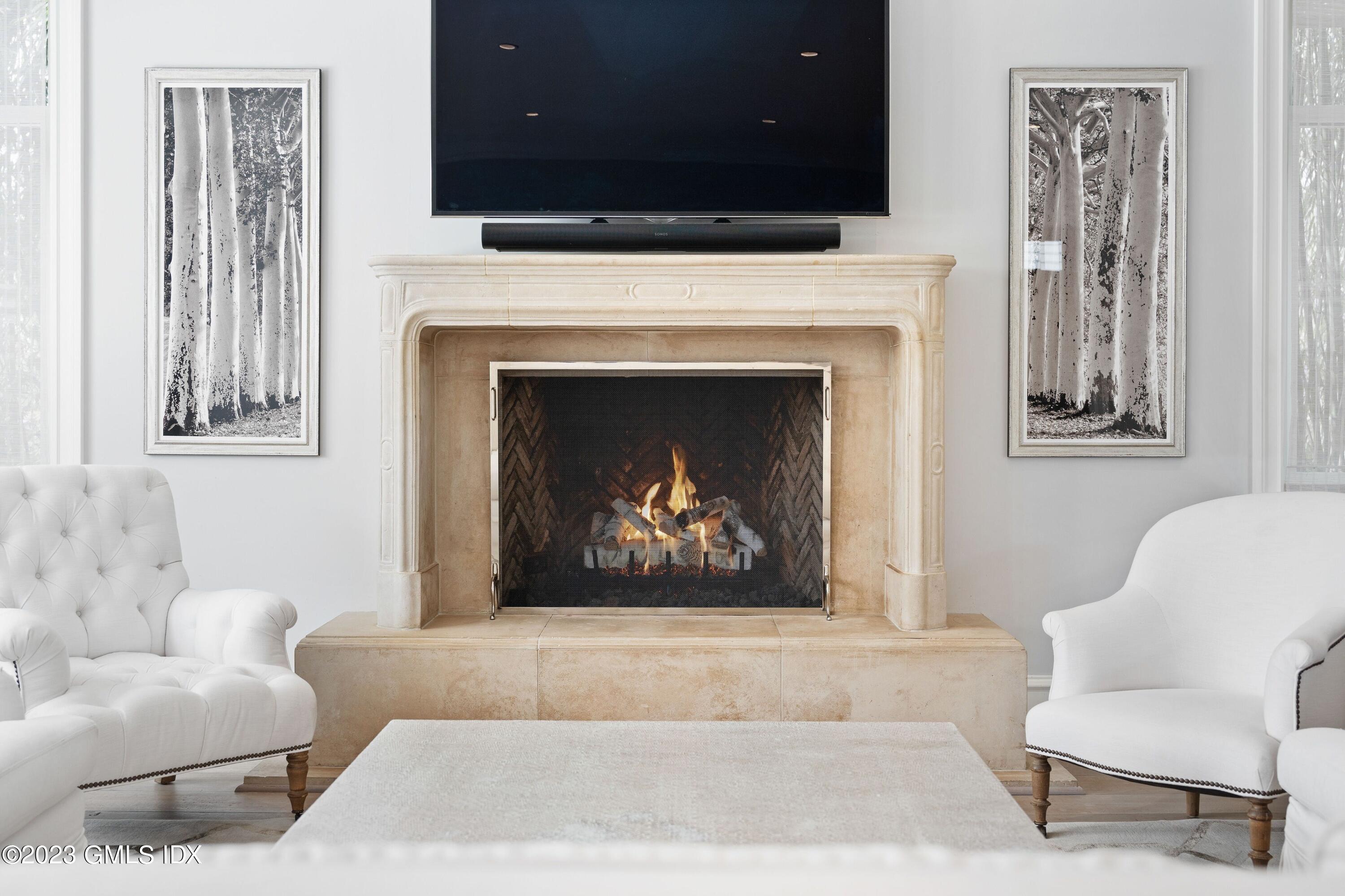 6 Cherry Lane Old Greenwich, CT 06870 - Photo 10 of 31 a living room with furniture and a fireplace