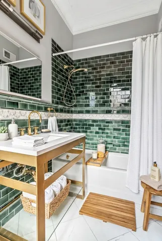 a living room with a wooden floor and a table