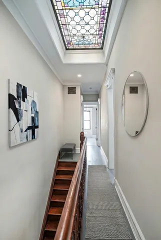 a spacious bathroom with a sink a mirror and a bathtub