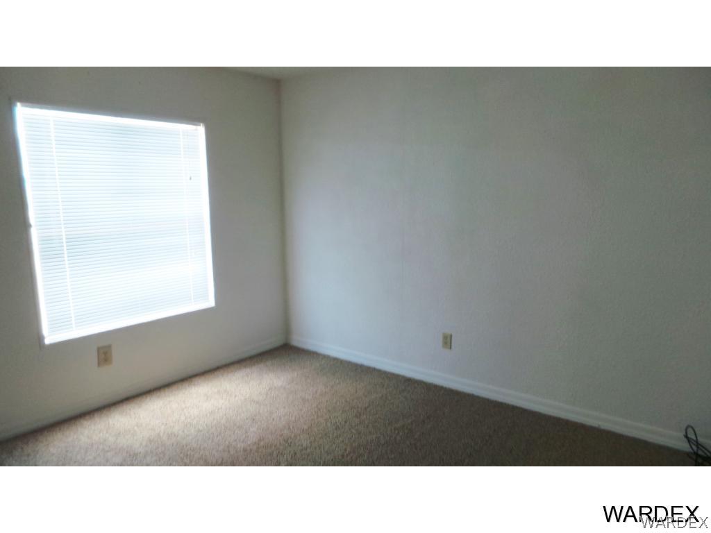 171 South Hano Road Golden Valley, AZ 86413 - Photo 12 of 20 a open hall with a window
