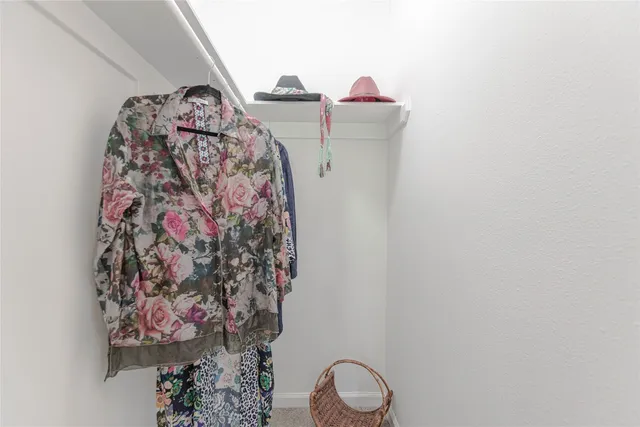 a bathroom with a toilet sink and curtain