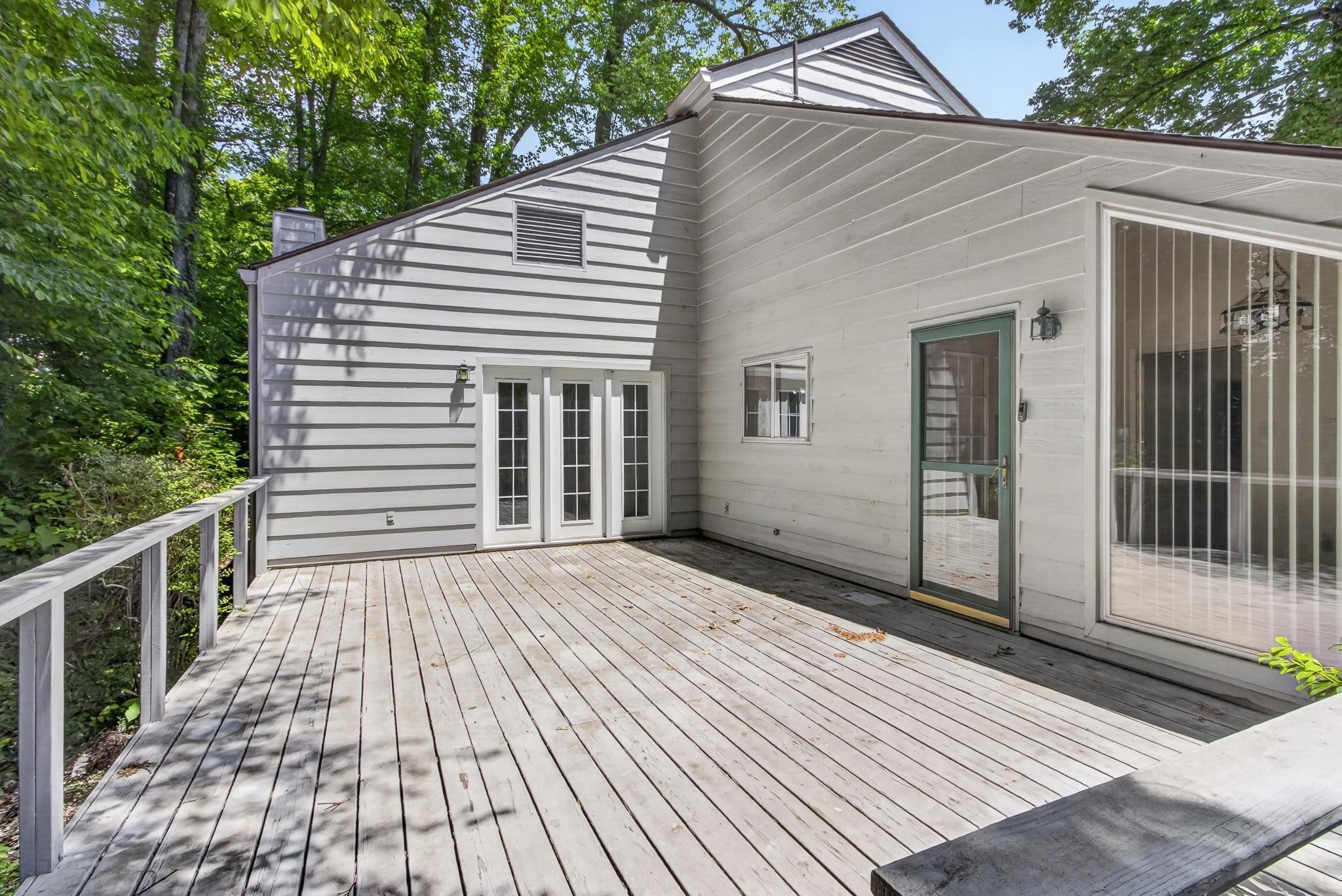 3121 Beechrun Drive Memphis, TN 38128 - Photo 36 of 40 The deck offers exceptional privacy and seamless connection to nature - ideal for morning coffee, outdoor dining, or quiet evenings enjoying the serene surroundings.