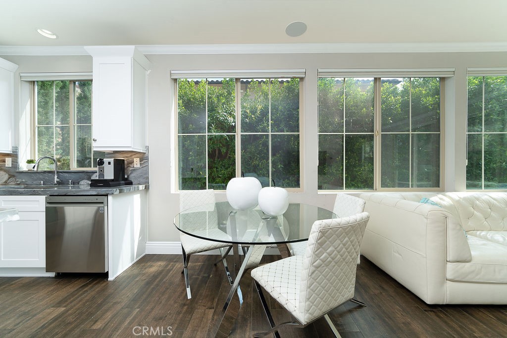 60 Visionary Irvine, CA 92618 - Photo 12 of 30 a living room with furniture and a large window