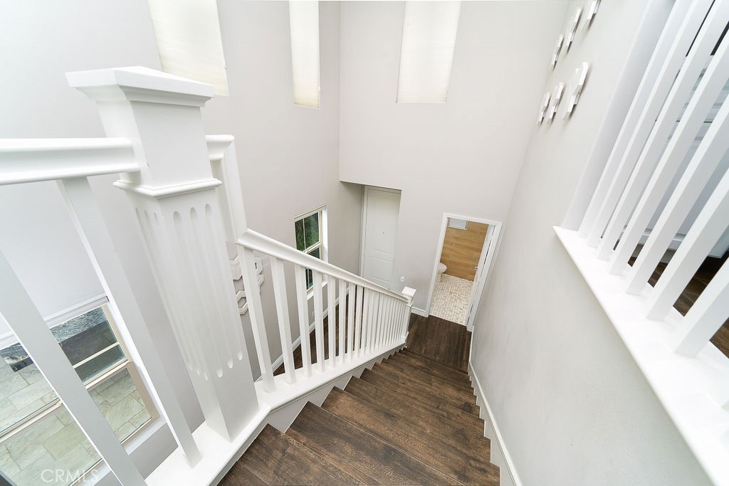 60 Visionary Irvine, CA 92618 - Photo 14 of 30 a view of entryway with stairs and wooden floor