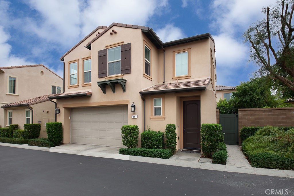 60 Visionary Irvine, CA 92618 - Photo 2 of 30 a front view of a house with garden
