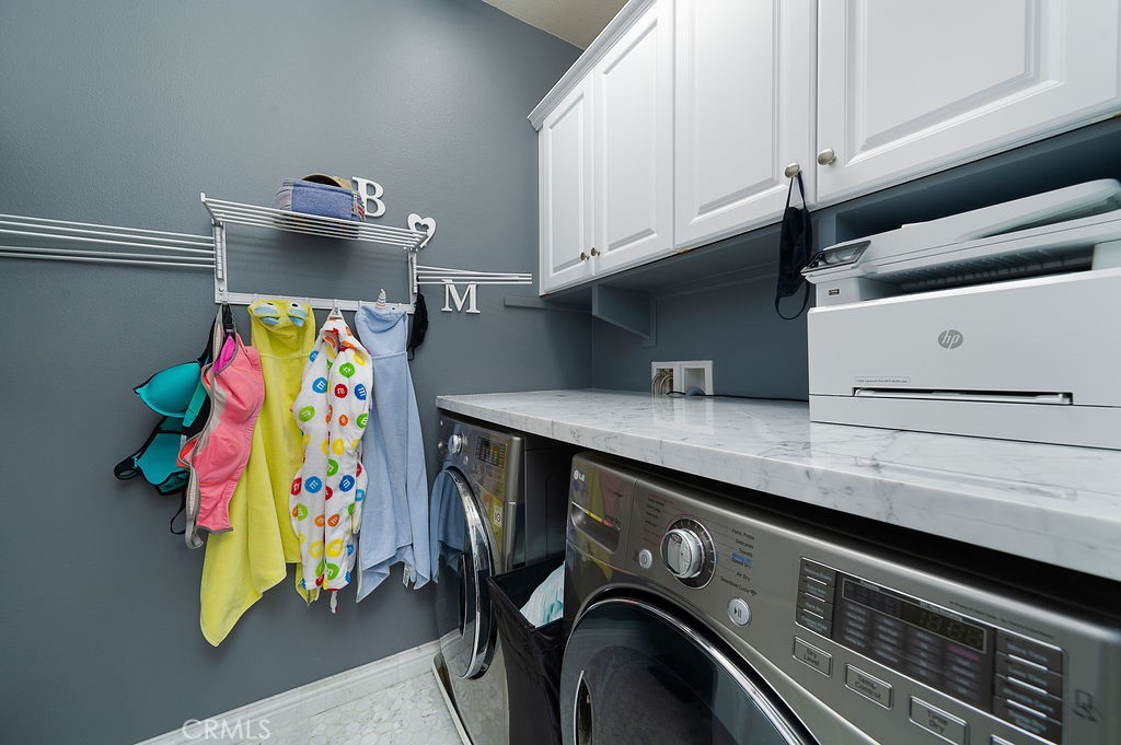 60 Visionary Irvine, CA 92618 - Photo 21 of 30 a utility room with dryer and washer