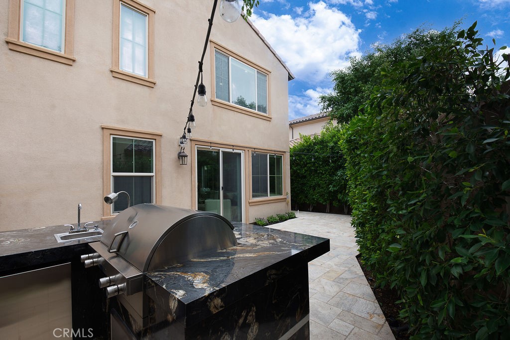 60 Visionary Irvine, CA 92618 - Photo 23 of 30 a backyard of a house with yard fire pit and outdoor seating
