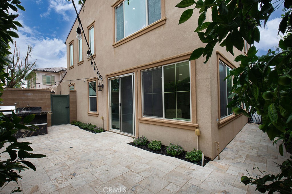 60 Visionary Irvine, CA 92618 - Photo 24 of 30 a view of a house with backyard and sitting area