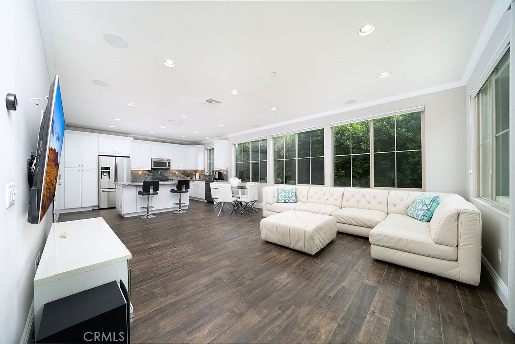 60 Visionary Irvine, CA 92618 - Photo 3 of 30 a living room with furniture and a large window