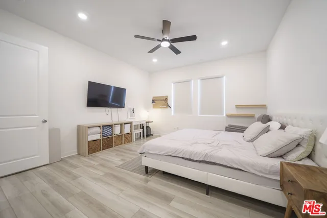 a view of a balcony with lake view and a potted plant