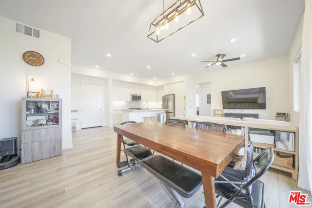 a bathroom with a shower and a sink