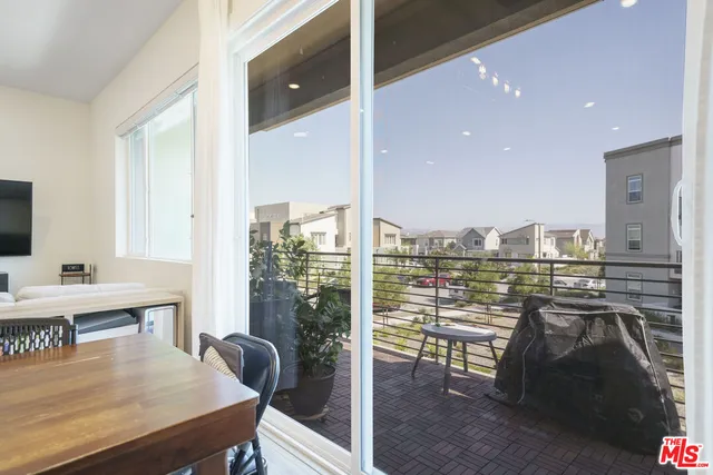 a spacious bathroom with a mirror and a sink