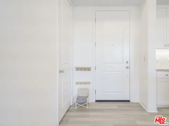 a view of swimming pool with outdoor seating and plants