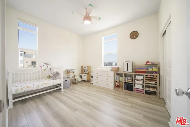 a view of a swimming pool with a lounge chair