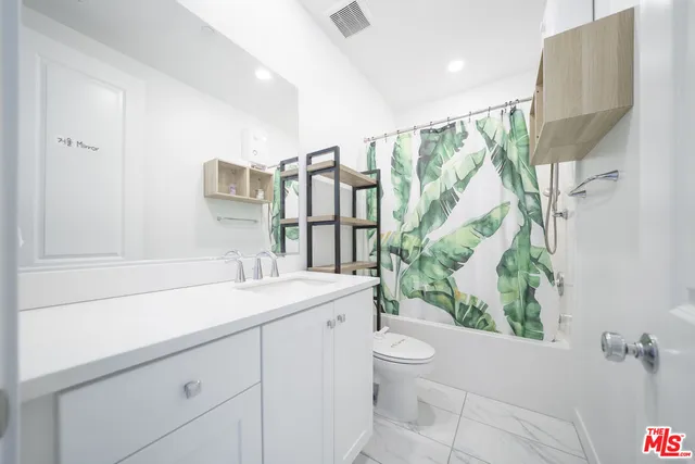 a view of a terrace with chairs