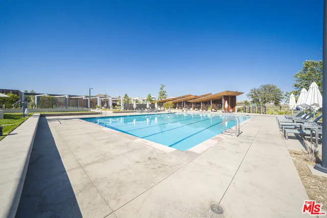 a view of a building with potted plants