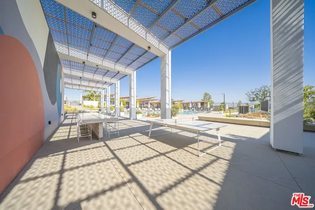 a view of a swimming pool with a yard