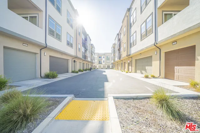 a view of a building with a garden